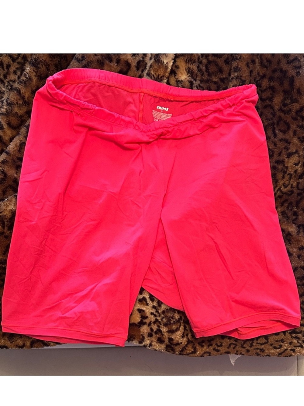 SKIMS Vibrant Coral Colored Thin Bike Shorts